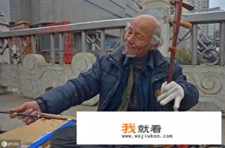 阿炳的《二泉映月》被称为二胡乐曲之王，在世界乐坛也占有一地，你同意这样的说法吗？