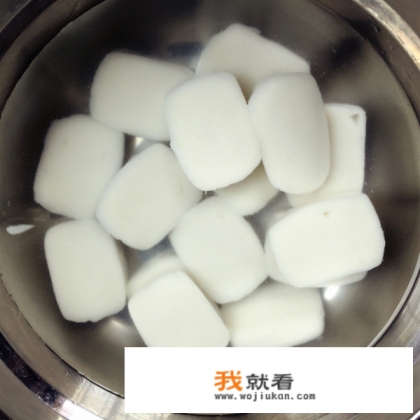 螃蟹炒年糕怎么做？